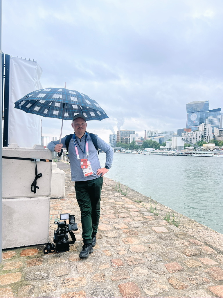 On assignment in Paris with camera equipment in the rain