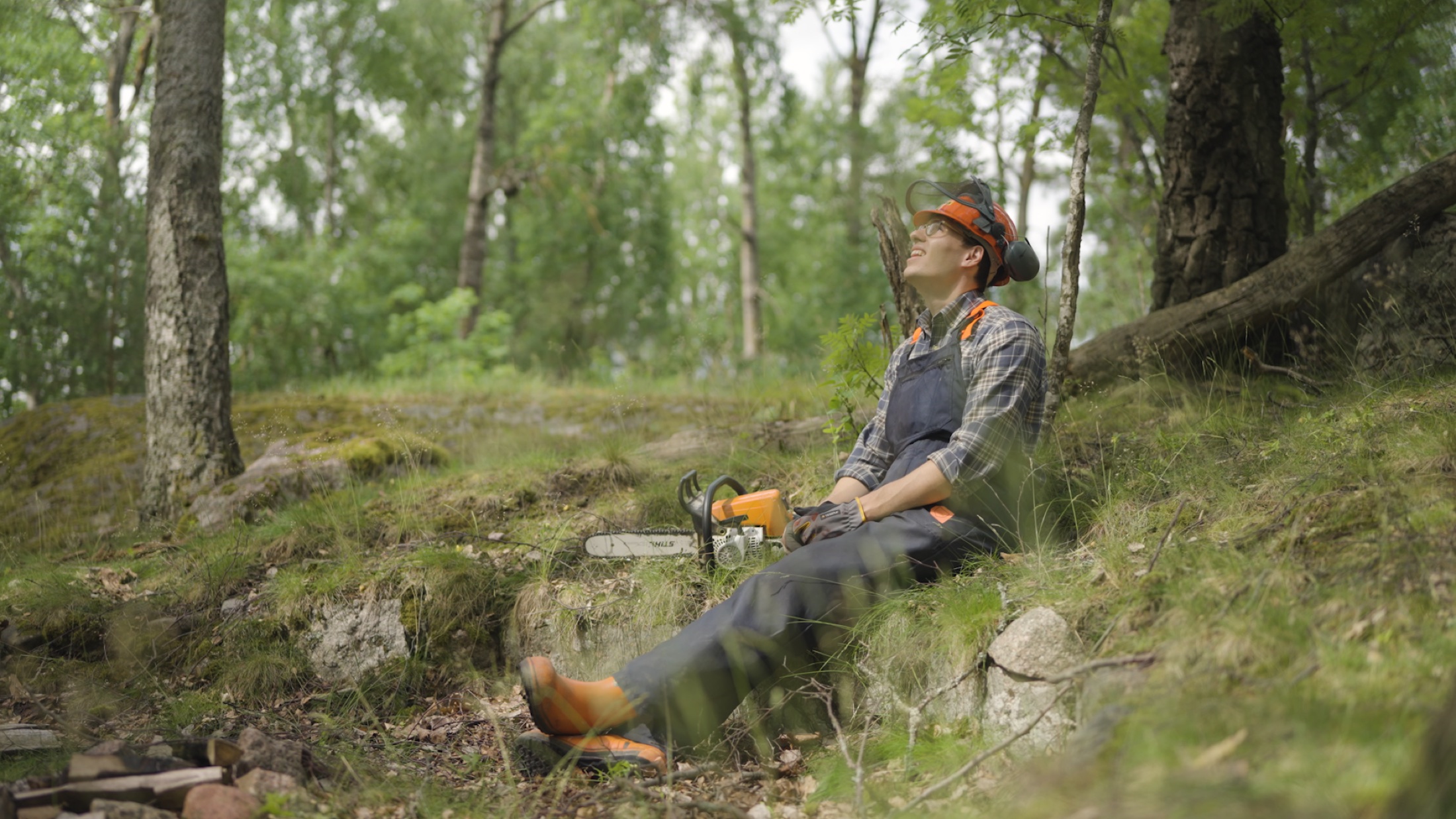 Forestry worker resting in the woods