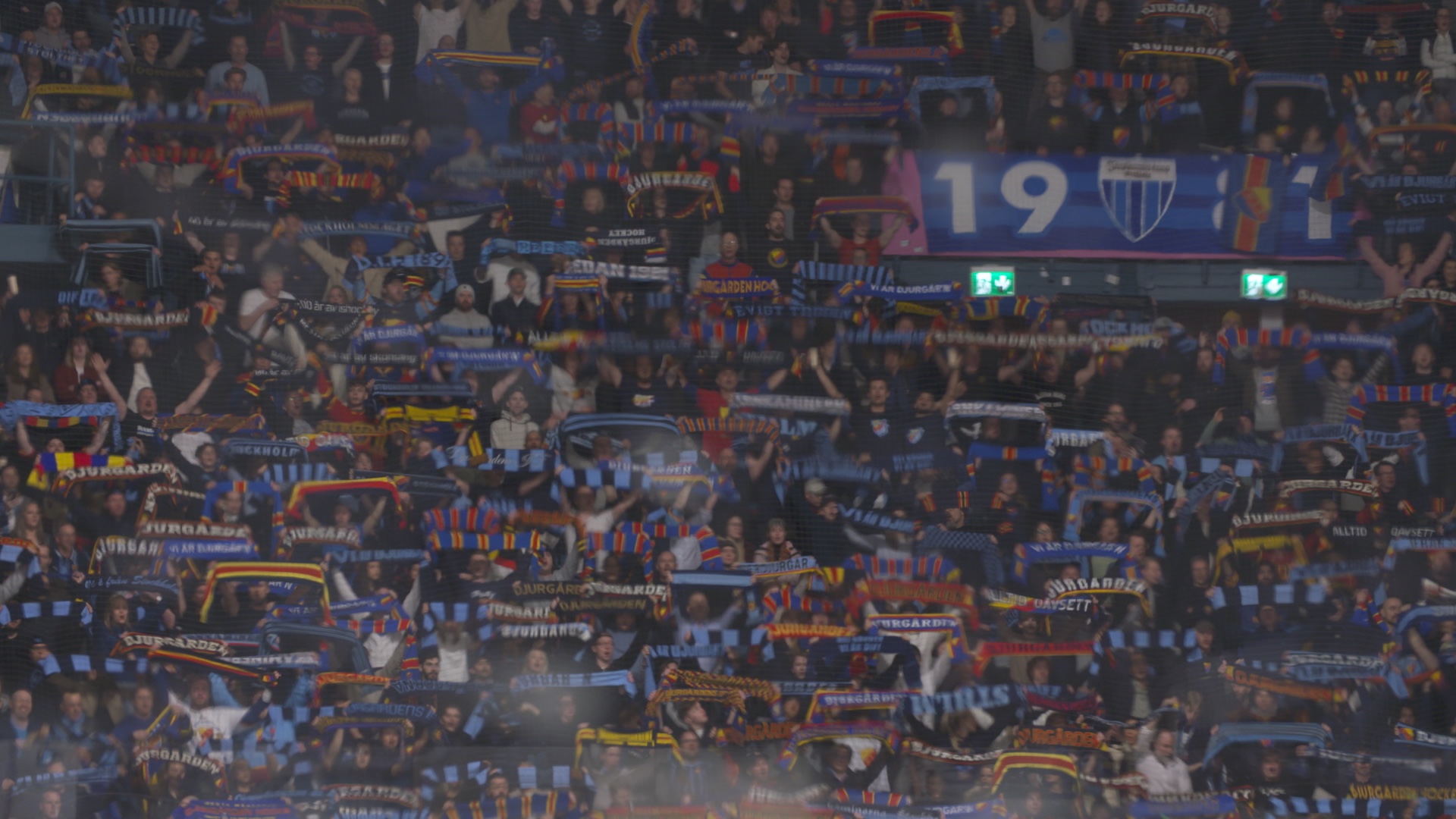 Djurgården supporters filling the stands with scarves